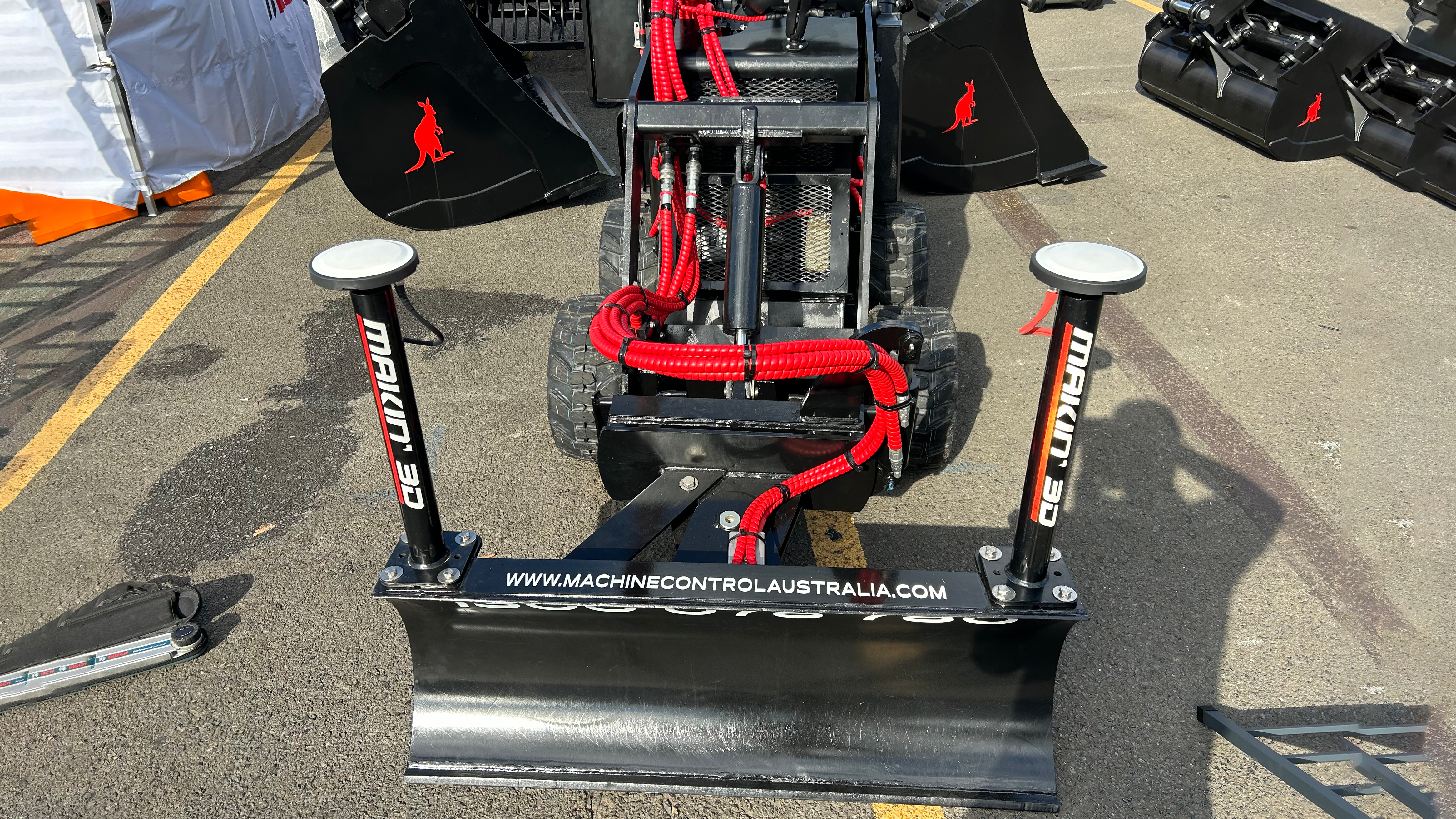 Tool Guidance installed on a skid steer machine